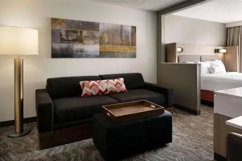 Sonesta Select Hotel Interior of room, couch