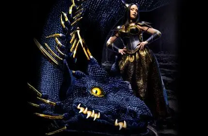 Female Cosplayer Posing in full black armer next to a dark blue and gold dragon