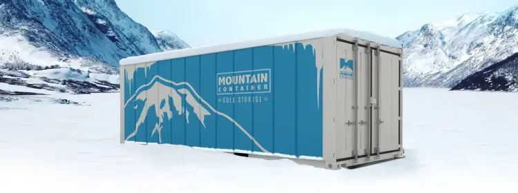 Mountain Container Cold Storage in the snow with mountain backdrop